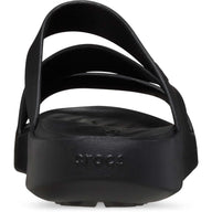 Black sandal with multiple straps on a white background