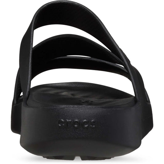Black sandal with multiple straps on a white background