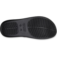 Black Crocs sandal sole on a white background
