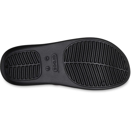 Black Crocs sandal sole on a white background