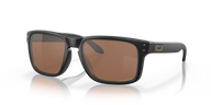 Black sunglasses with brown lenses on a white background