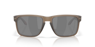 A pair of square-frame sunglasses with a matte taupe-brown frame and dark gray lenses, shown against a clean white background with a subtle reflection.