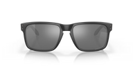 Black sunglasses with reflective lenses on a black background
