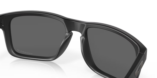 Black sunglasses with a reflective surface on a white background