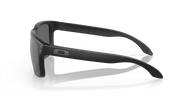 Black sunglasses with a reflective surface on a white background