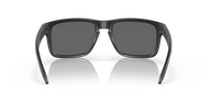 Black sunglasses with a reflective surface on a black background
