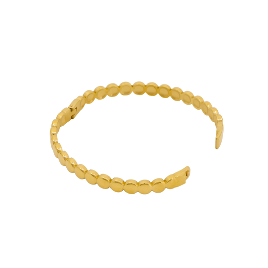 Gold beaded headband on a white background