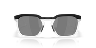 Sunglasses with black and clear frame on a reflective surface