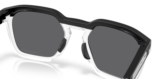 Sunglasses with black and white frame on a clear background