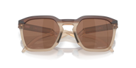 Sunglasses with brown lenses and beige frame on a white background