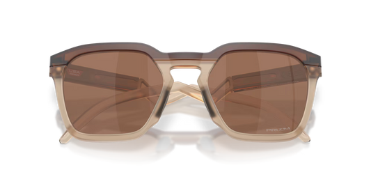 Sunglasses with brown lenses and beige frame on a white background