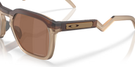 Sunglasses with a brown lens and beige frame on a transparent background