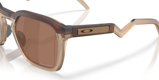 Sunglasses with a brown lens and beige frame on a transparent background