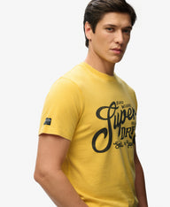 yellow superdry tee with big chest logo 