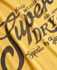 yellow superdry tee with big chest logo 