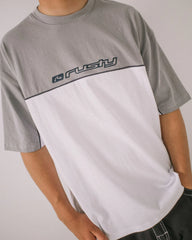 Gray and white t-shirt with 'rusty' logo on a plain background