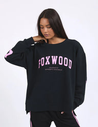 Person wearing a black outfit with pink text on a white background