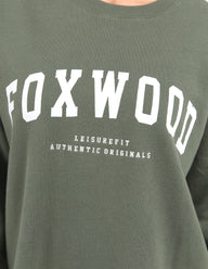 Green sweatshirt with 'FOXWOOD' printed on it