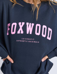 Navy sweatshirt with 'FOXWOOD' printed in pink on a white background