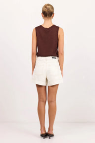 ecru coloured shorts on model 