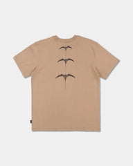 pale khaki tee with chest logo and design down the back