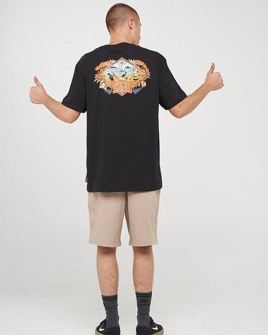 Person wearing a black t-shirt with a colorful design on the back, giving a thumbs-up gesture.
