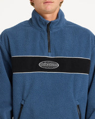 Blue fleece pullover with a black stripe and logo on a white background