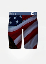 boys boxer briefs featuring an all-over American flag print, with a dark blue waistband displaying the 'ethika' brand logo.