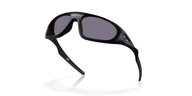 Black sunglasses with dark lenses on a white background