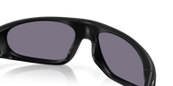 Black sunglasses with gray lenses on a white background