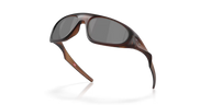 Sunglasses with brown frame and dark lenses on a white background