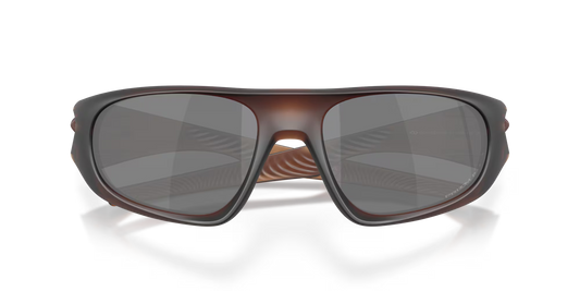 Sunglasses with a reflective surface on a black background