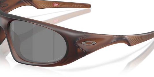 Brown sunglasses with a clear lens on a transparent background