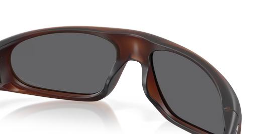 Brown sunglasses with a reflective surface on a clear background