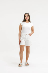 white denim shorts on female model