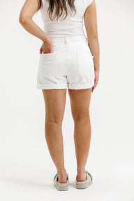 white denim shorts on female model