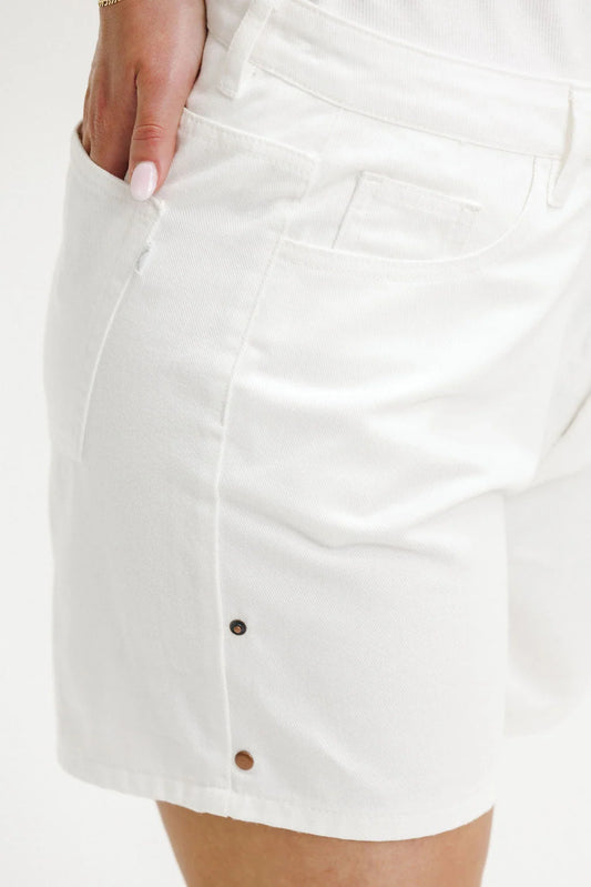 white denim shorts on female model