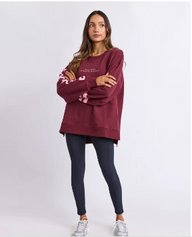 burgandy crew neck sweatshirt with pink writting