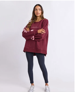 burgandy crew neck sweatshirt with pink writting