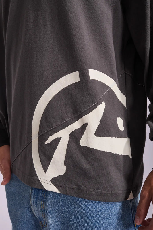 Black jacket with a white logo on a plain background