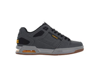 Gray sneaker with visible brand logo on a white background