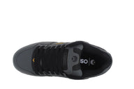 Black sneaker with visible brand logo on a white background