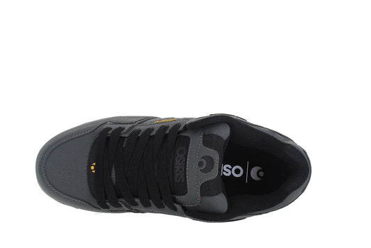 Black sneaker with visible brand logo on a white background