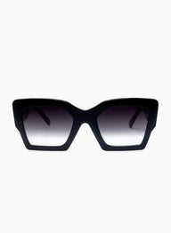 Black sunglasses with gradient lenses on a white background