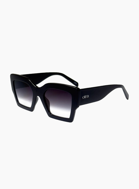 Black sunglasses with gradient lenses on a white background