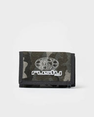A camouflage bi-fold wallet with a white embroidered Rushy logo on the front, set against a plain light gray background.