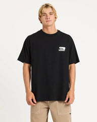 Person wearing a black t-shirt with a logo on a white background