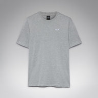 A light gray heather crewneck t-shirt with a small white oval logo on the left chest, displayed against a neutral gray gradient background.