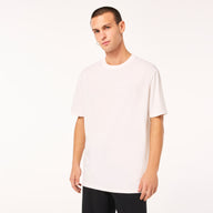 Man wearing a plain white t-shirt on a white background