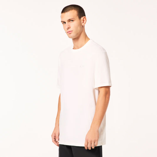 Man wearing a plain white t-shirt on a white background